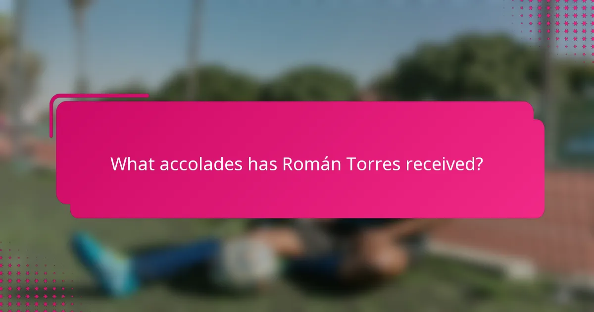 What accolades has Román Torres received?